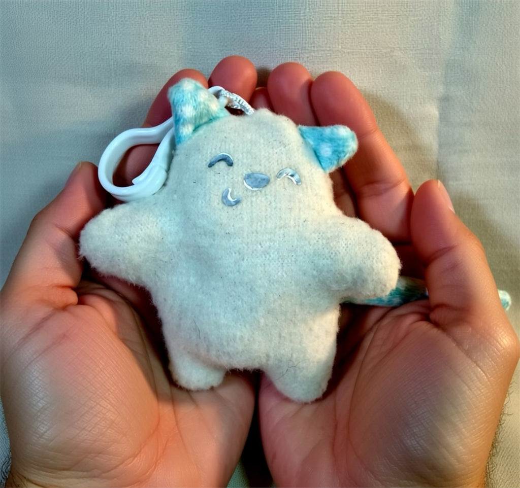 'Uggokin' Palm Monster Plush Keychain- Soft Kitty