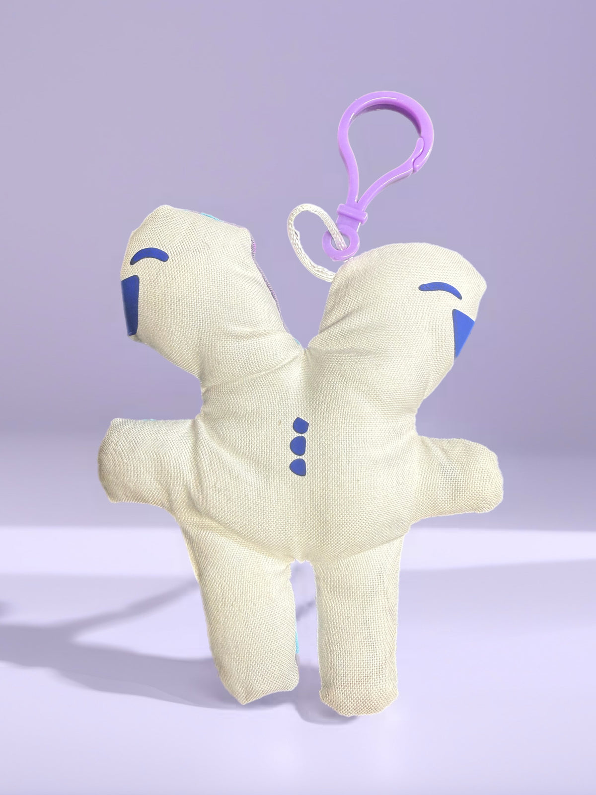 'Uggokin' Palm Monster Plush Keychain- 2 face 2 head?