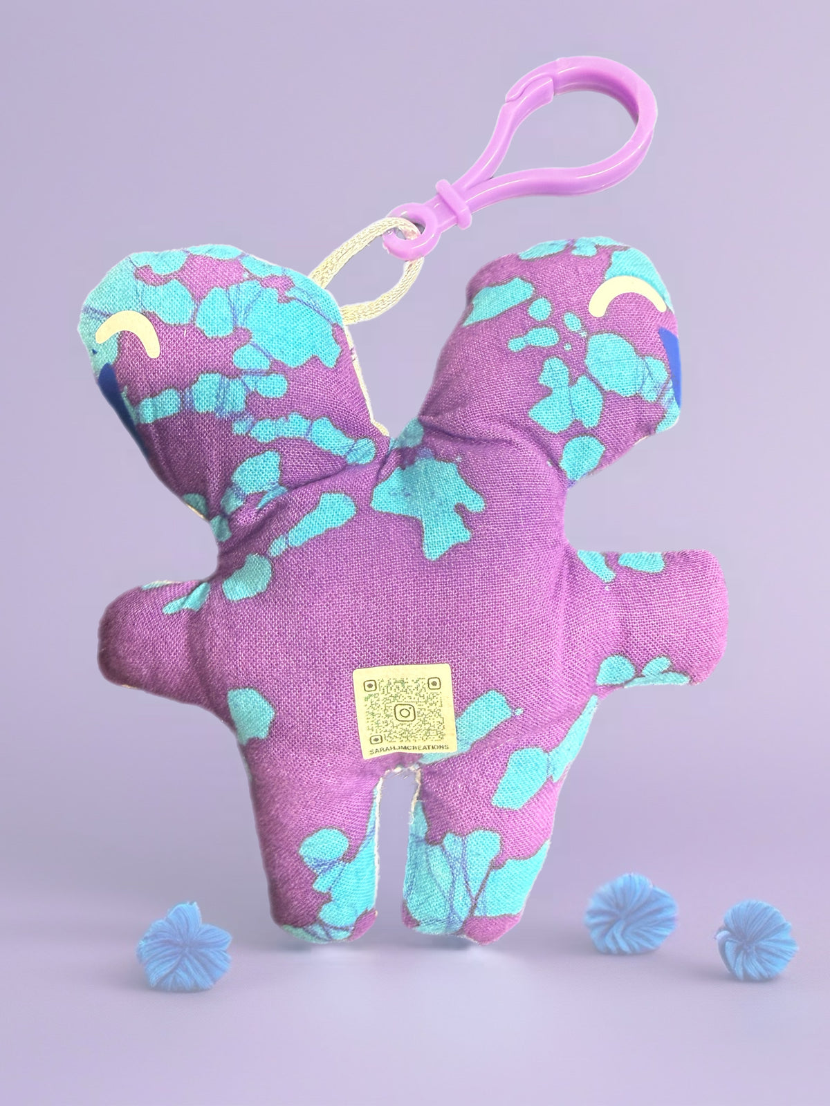 'Uggokin' Palm Monster Plush Keychain- 2 face 2 head?