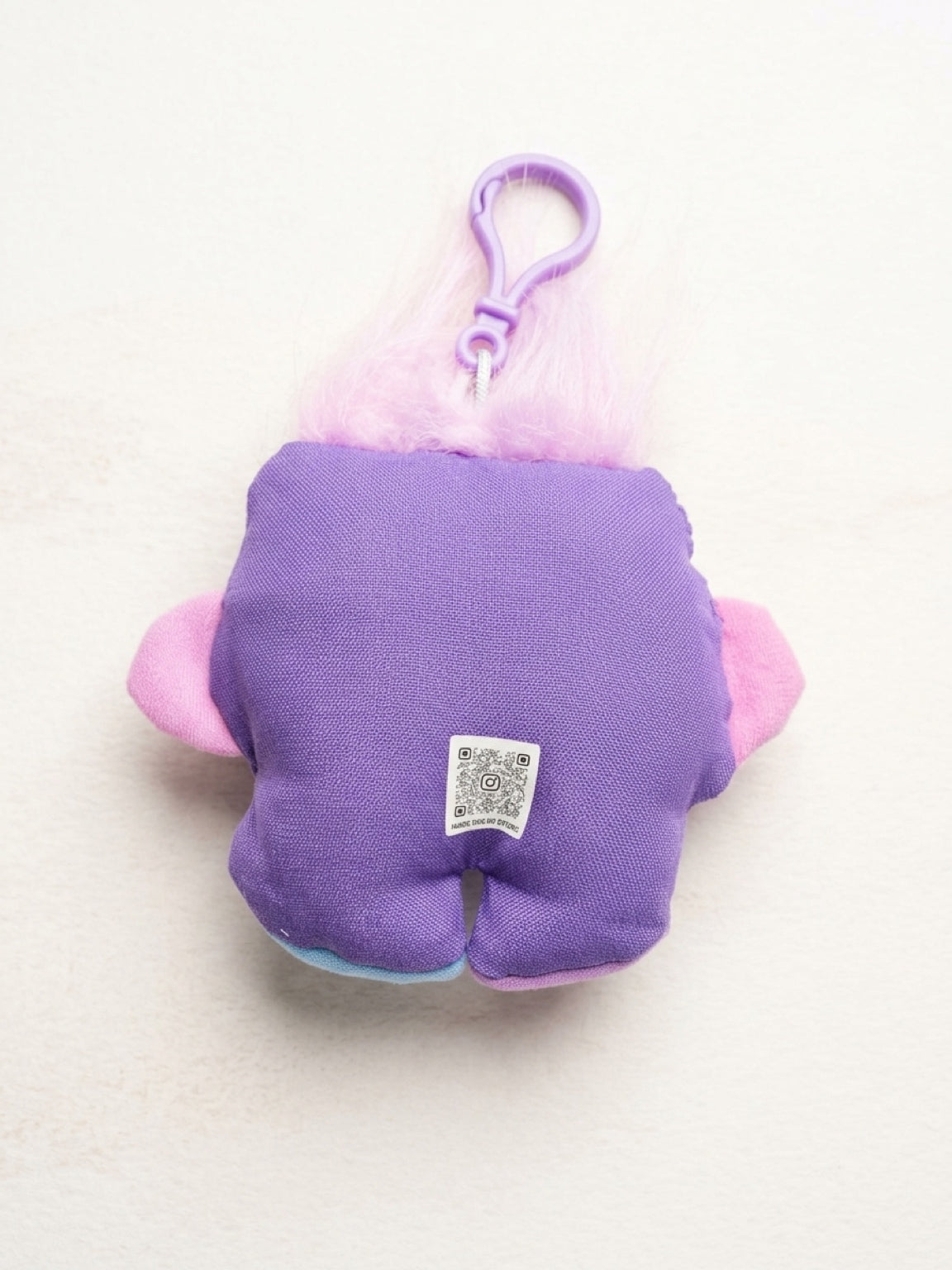 'Uggokin' Palm Monster Plush Keychain- Pacifier Dude